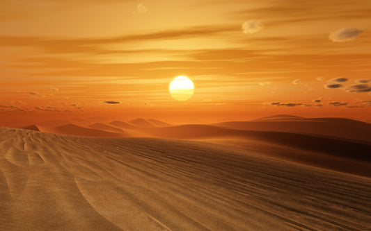 The Sun Sets Over Endless Sands